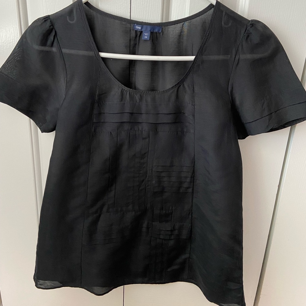 Blouse is black and can be used for casual or dressy